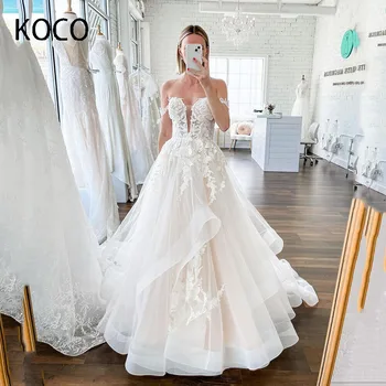 מקדוגל סקסי V צוואר שמלות כלה את הכתף פרע אפליקציות תחרה שמלות כלה-A-line החלוק de mariée בהזמנה אישית