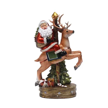 סנטה קלאוס מסתובב מעץ צבי בבית סלון שולחן העבודה זירת פריסת קישוטי חג המולד קישוטים
